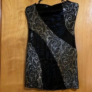 By Carolina. Size Large.